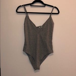 Deep v neck grey body suit